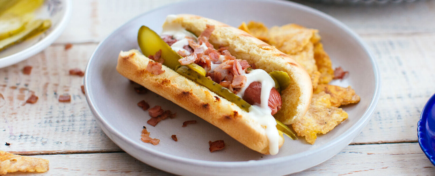 Crispy Ham, Salami, Pickles, and Melted Swiss Cheese Hot Dog.jpg