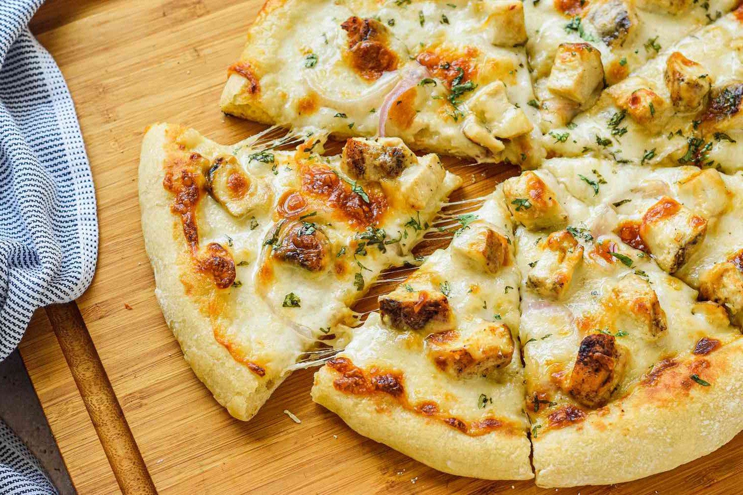 Simply-Recipes-Chicken-Alfredo-Pizza-Lead-Shot-3b-6df9d82a4fd3451fa954a7f6ae1c6191.jpg